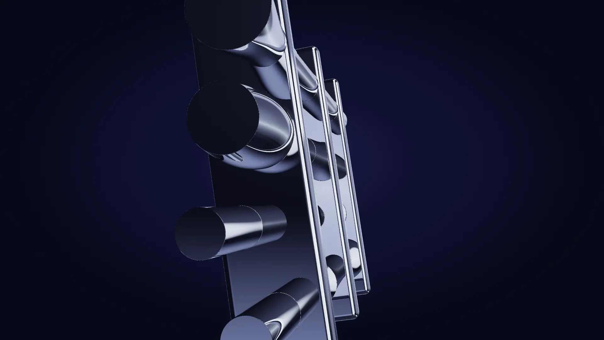 Chrome conduits held in machined brackets — from a low angle
