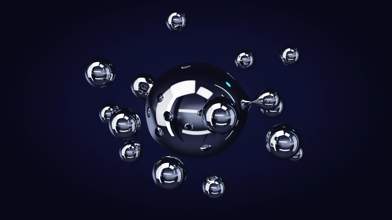 Chrome drops joining the larger form, close up